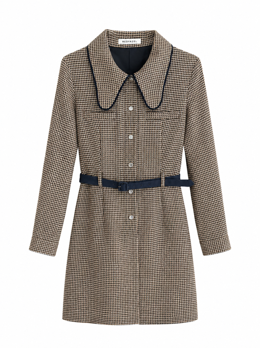 A women's knee-length houndstooth coat in beige and brown with a navy blue collar, trim, and matching belt, shown on a plain white background.