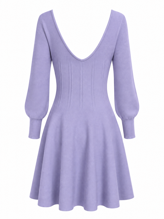 A light purple long-sleeve knit dress with a deep V-neckline, vertical seam detailing on the bodice, and a flared skirt, shown against a plain white background.